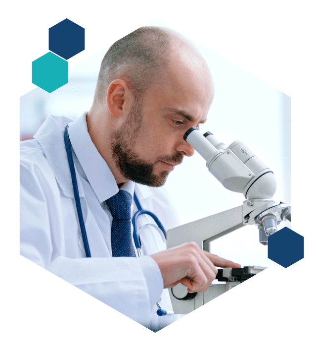 man looking into scope